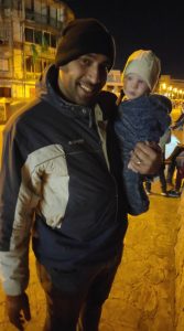 With the son.